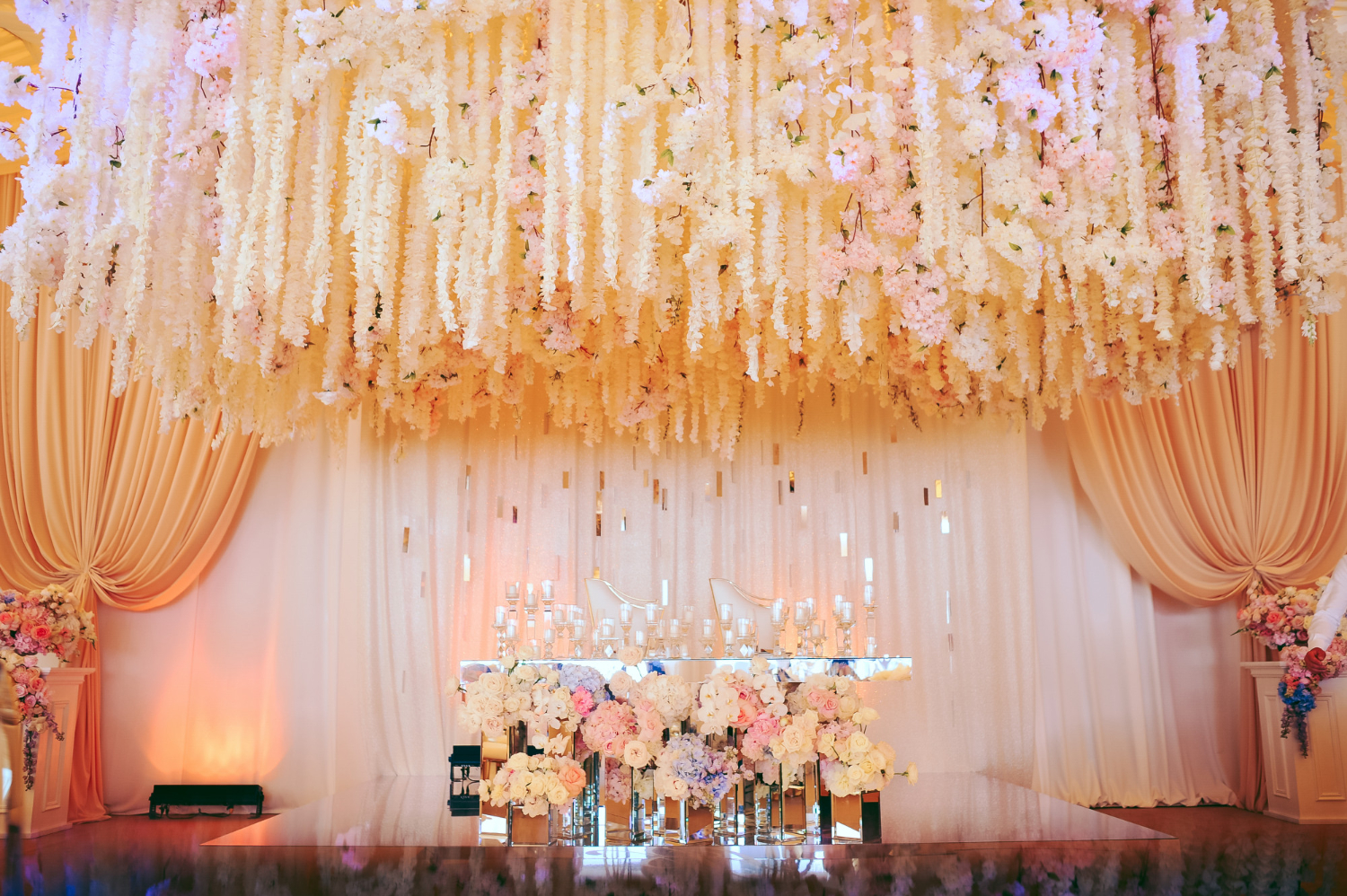 groom-bride-s-wedding-table-decorated-with-flowers-candles